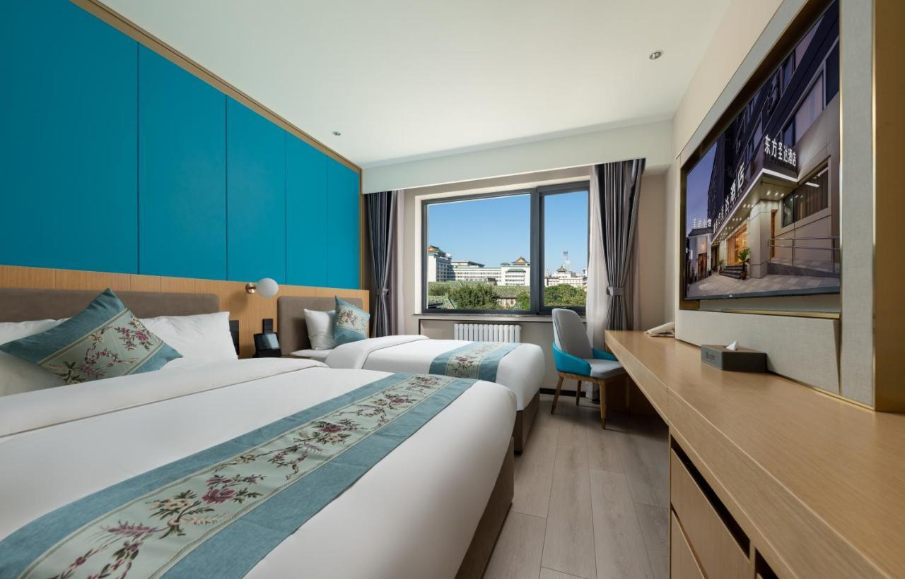 East Sacred Hotel--Very Near Beijing Tiananmen Square ,The Forbidden City,The Temple Of Heaven ,3 Minutes' Walk To Wangfujing Subway ,Located In The Center Of Beijing, Many Shopping Malls Around,Newly Renovated Hotel-Able To Receive Foreign Guests المظهر الخارجي الصورة Deluxe room